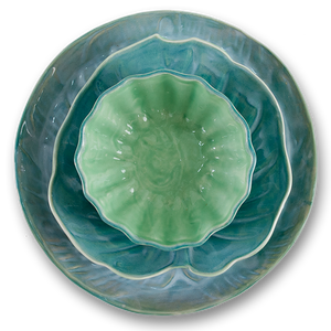 Handmade porcelain plates in gorgeous teals, turquoise and antiqued jade made in Jamaica, inspired by Jamaica's rainforests and beautiful and exotic tropical flora.