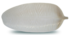 Large handmade white porcelain banana leaf shaped and textured dinnerware platter for dining and entertaining, serving, table centerpieces, and wall decor.