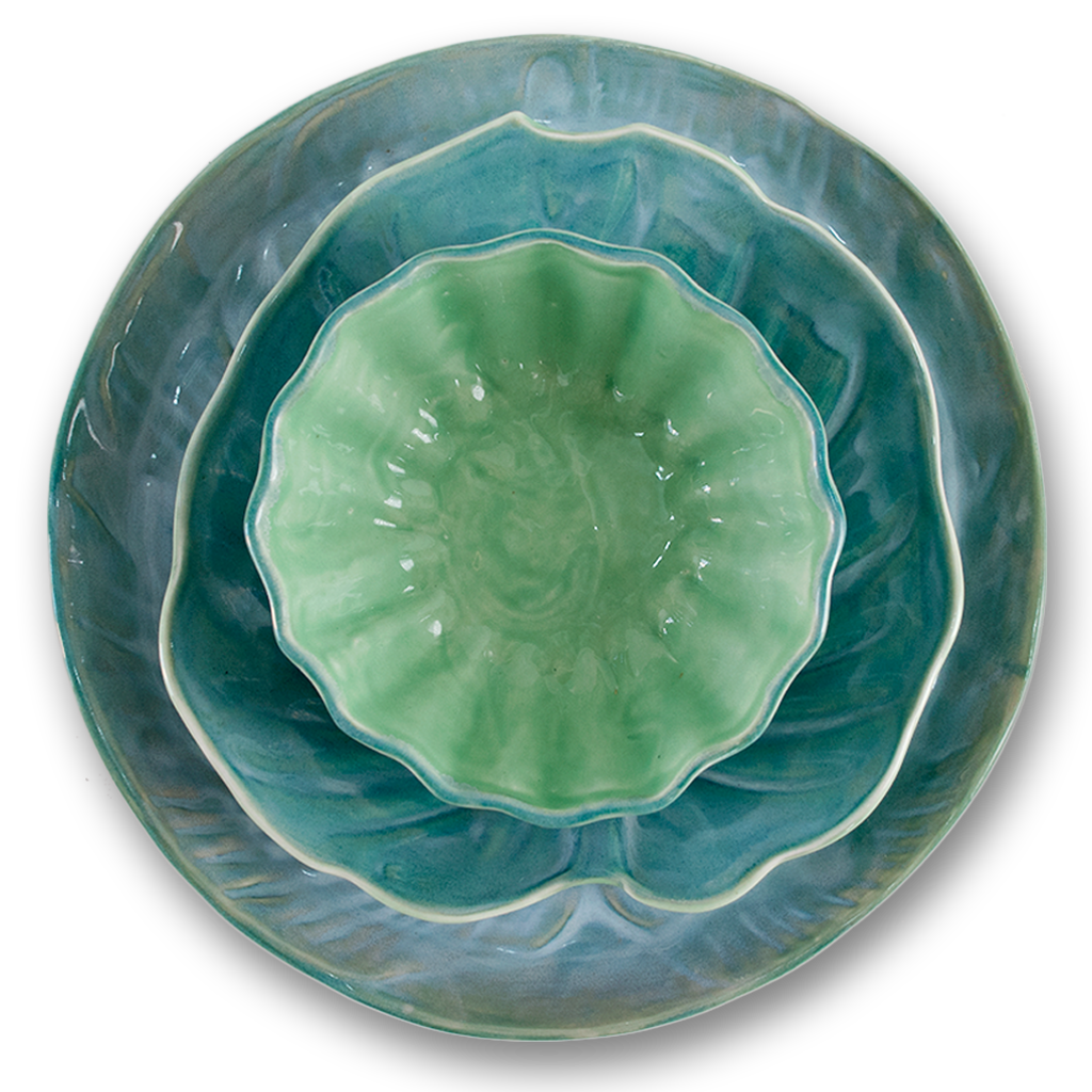 Handmade porcelain plates in gorgeous teals, turquoise and antiqued jade made in Jamaica, inspired by Jamaica's rainforests and beautiful and exotic tropical flora.