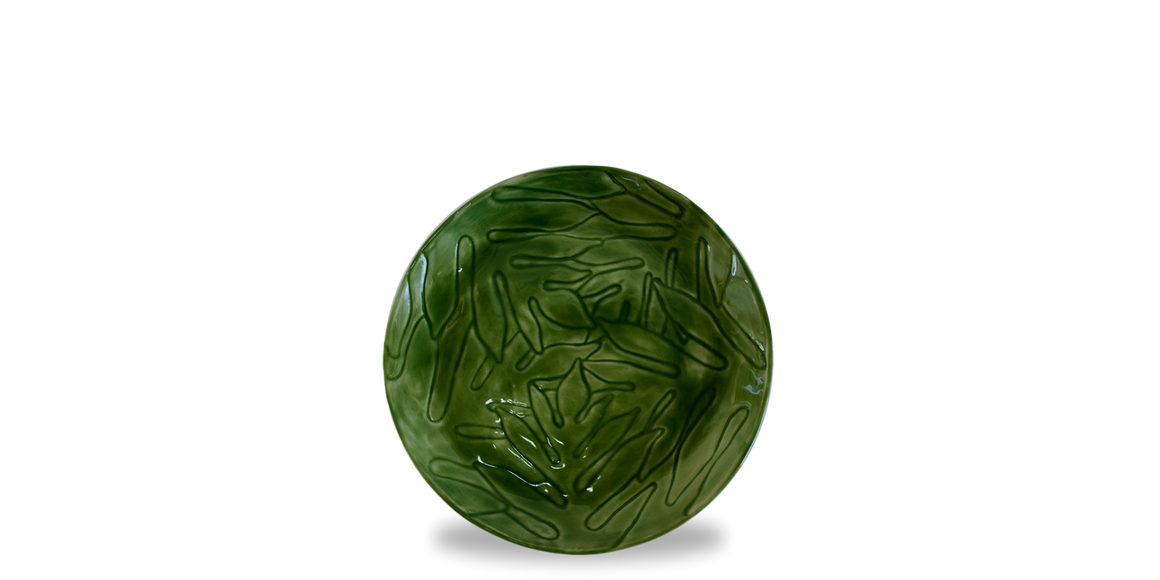 Breadfruit leaf etched pattern in a salad plate glazed in a vibrant green to mimic the leaves of a breadfruit tree.  Stunning example of modern Jamaican pottery and Jamaican ceramics